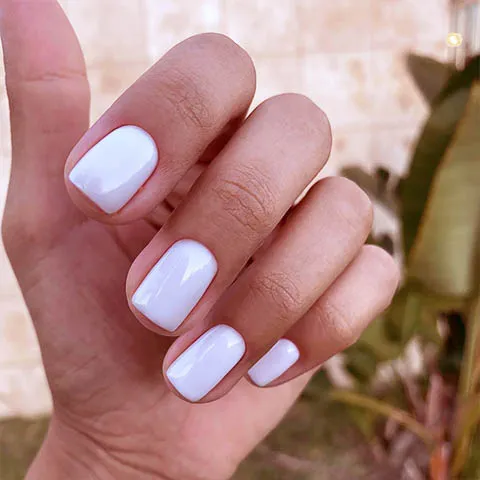 Gel nails in soft lilac white