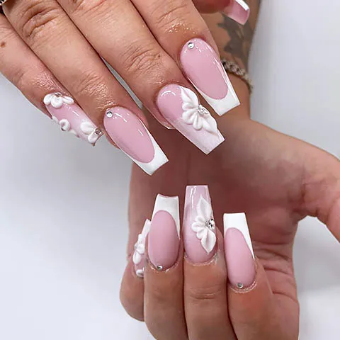 Long square nails with a white French tip and white flowers