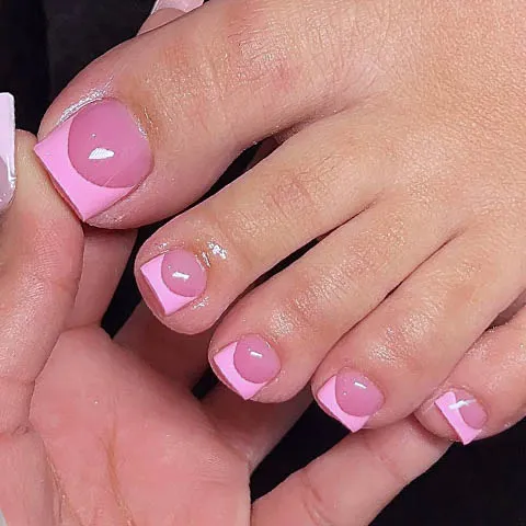 A pedicure with pink French tips